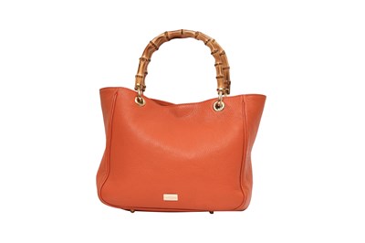 Lot 143 - RUSSELL & BROMLEY ORANGE LEATHER HANDBAG WITH BAMBOO HANDLES