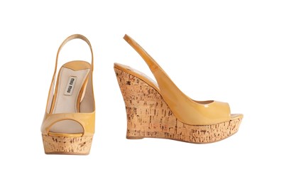 Lot 124 - MIU MIU YELLOW/TAN PATENT LEATHER CORK WEDGE SLINGBACK SANDALS