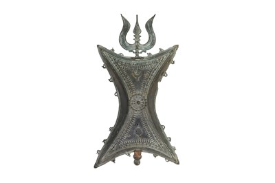 Lot 56 - A CEREMONIAL BRONZE HANDGUARD WITH A SHAIVA TRISULA (TRIDENT)