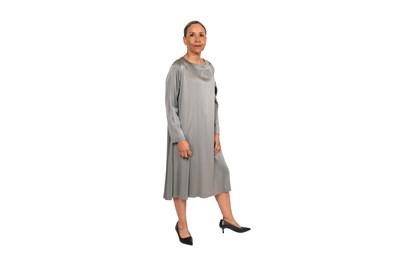 Lot 91 - A DRIES VAN NOTEN SILVER-GREY SATIN DRAPED DRESS