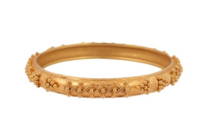 Lot 78 - A GOLD, GRANULATED BANGLE