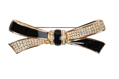 Lot 233 - CHRISTIAN DIOR GERMANY RHINESTONE AND BLACK ENAMEL BOW BROOCH