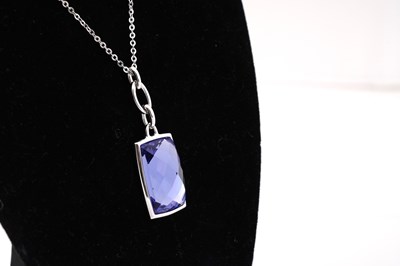 Lot 27 - A SWAROVSKI RHODIUM-PLATED 'TANZANITE' COLOUR CRYSTAL PENDANT NECKLACE