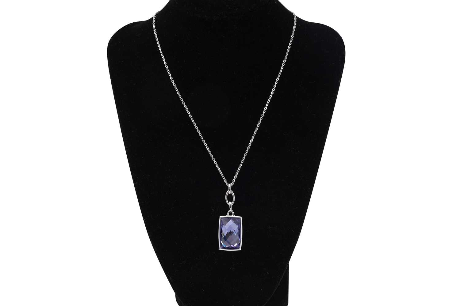 Lot 27 - A SWAROVSKI RHODIUM-PLATED 'TANZANITE' COLOUR CRYSTAL PENDANT NECKLACE