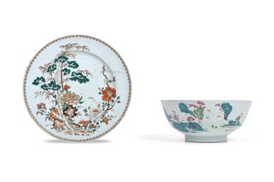 Lot 11 - A CHINESE FAMILLE VERTE 'THREE FRIENDS OF WINTER' CHARGER AND A FAMILLE ROSE 'LANDSCAPE' BOWL