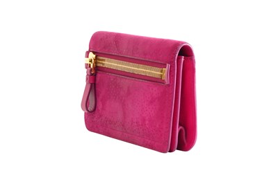 Lot 132 - A TOM FORD FUCHSIA GRAINED LEATHER CLUTCH BAG