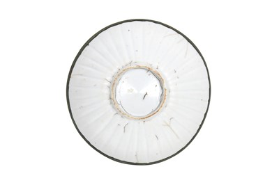 Lot 6 - A CHINESE LOBED DING WARE BOWL