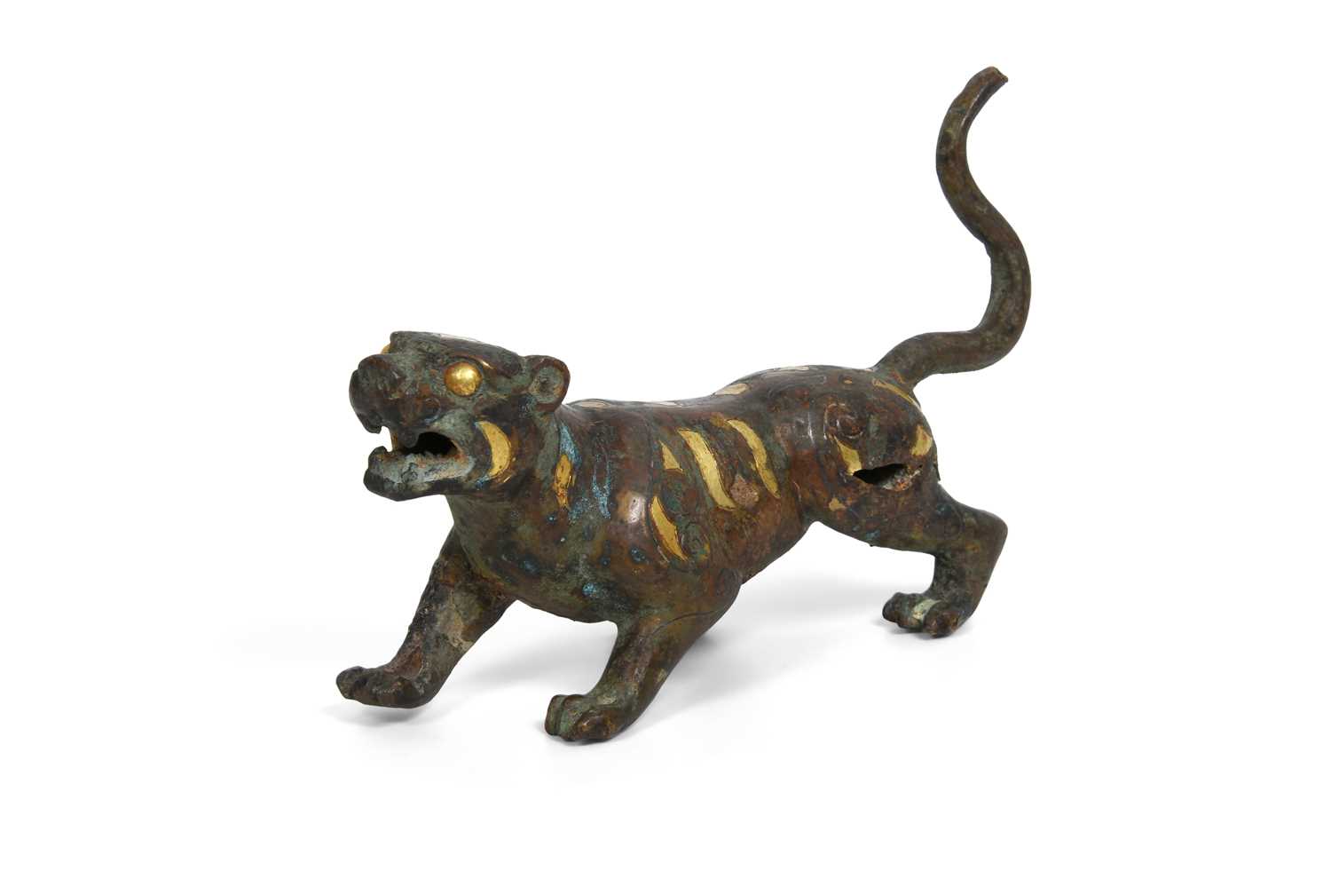 Lot 8 - A CHINESE PARCEL-GILT BRONZE FIGURE OF A TIGER