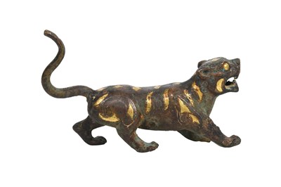 Lot 8 - A CHINESE PARCEL-GILT BRONZE FIGURE OF A TIGER