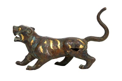Lot 8 - A CHINESE PARCEL-GILT BRONZE FIGURE OF A TIGER