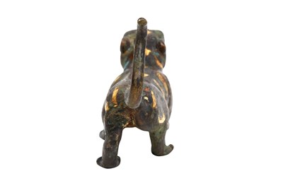 Lot 8 - A CHINESE PARCEL-GILT BRONZE FIGURE OF A TIGER