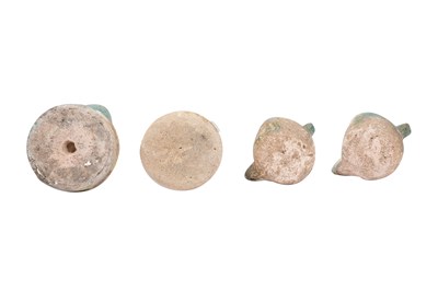 Lot 6 - A COLLECTION OF FOUR PERSIAN SELJUK GLAZED POTTERY OIL LAMPS