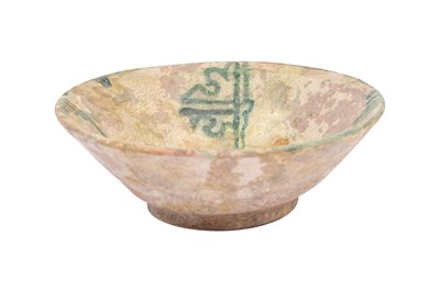 Lot 1 - A ABBASID POTTERY BOWL WITH STYLISED KUFIC CALLIGRAPHY