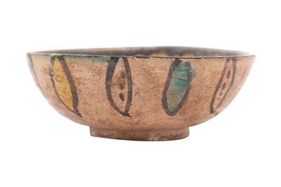 Lot 4 - A NISHAPUR GLAZED POTTERY BOWL