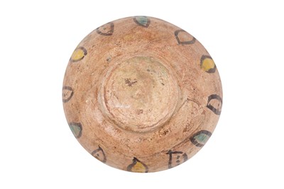 Lot 4 - A NISHAPUR GLAZED POTTERY BOWL