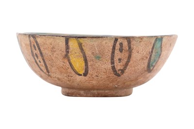 Lot 4 - A NISHAPUR GLAZED POTTERY BOWL
