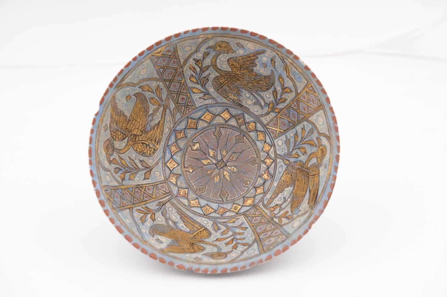 Lot 12 - A LAJVARDINA GILDED POTTERY BOWL