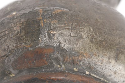 Lot 36 - A TIMURID ENGRAVED TINNED COPPER JUG (MASHRABE)