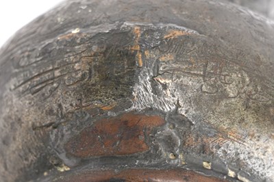 Lot 36 - A TIMURID ENGRAVED TINNED COPPER JUG (MASHRABE)