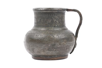 Lot 36 - A TIMURID ENGRAVED TINNED COPPER JUG (MASHRABE)