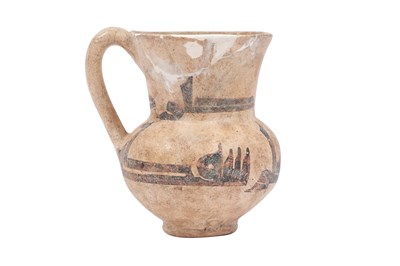 Lot 5 - A SMALL SAMANID POTTERY JUG WITH KUFIC CALLIGRAPHY
