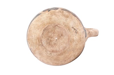 Lot 5 - A SMALL SAMANID POTTERY JUG WITH KUFIC CALLIGRAPHY