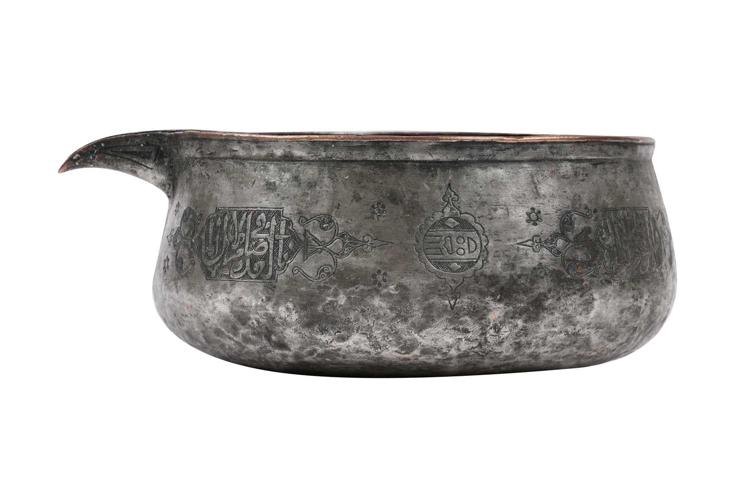 Lot 35 - A MAMLUK ENGRAVED TINNED COPPER POURING VESSEL