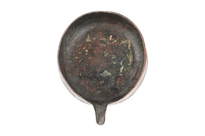 Lot 35 - A MAMLUK ENGRAVED TINNED COPPER POURING VESSEL