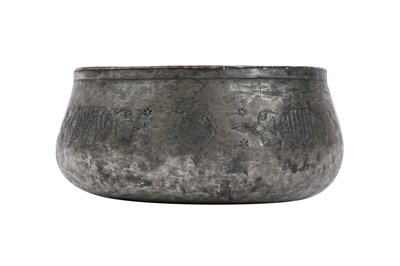 Lot 35 - A MAMLUK ENGRAVED TINNED COPPER POURING VESSEL