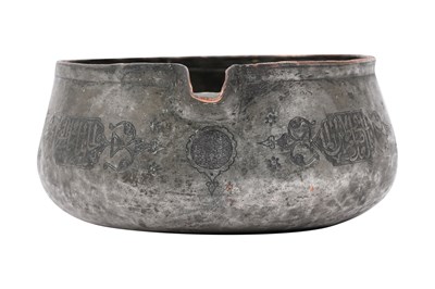 Lot 35 - A MAMLUK ENGRAVED TINNED COPPER POURING VESSEL