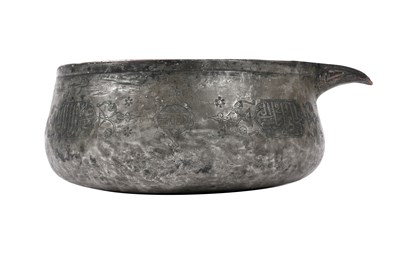 Lot 35 - A MAMLUK ENGRAVED TINNED COPPER POURING VESSEL