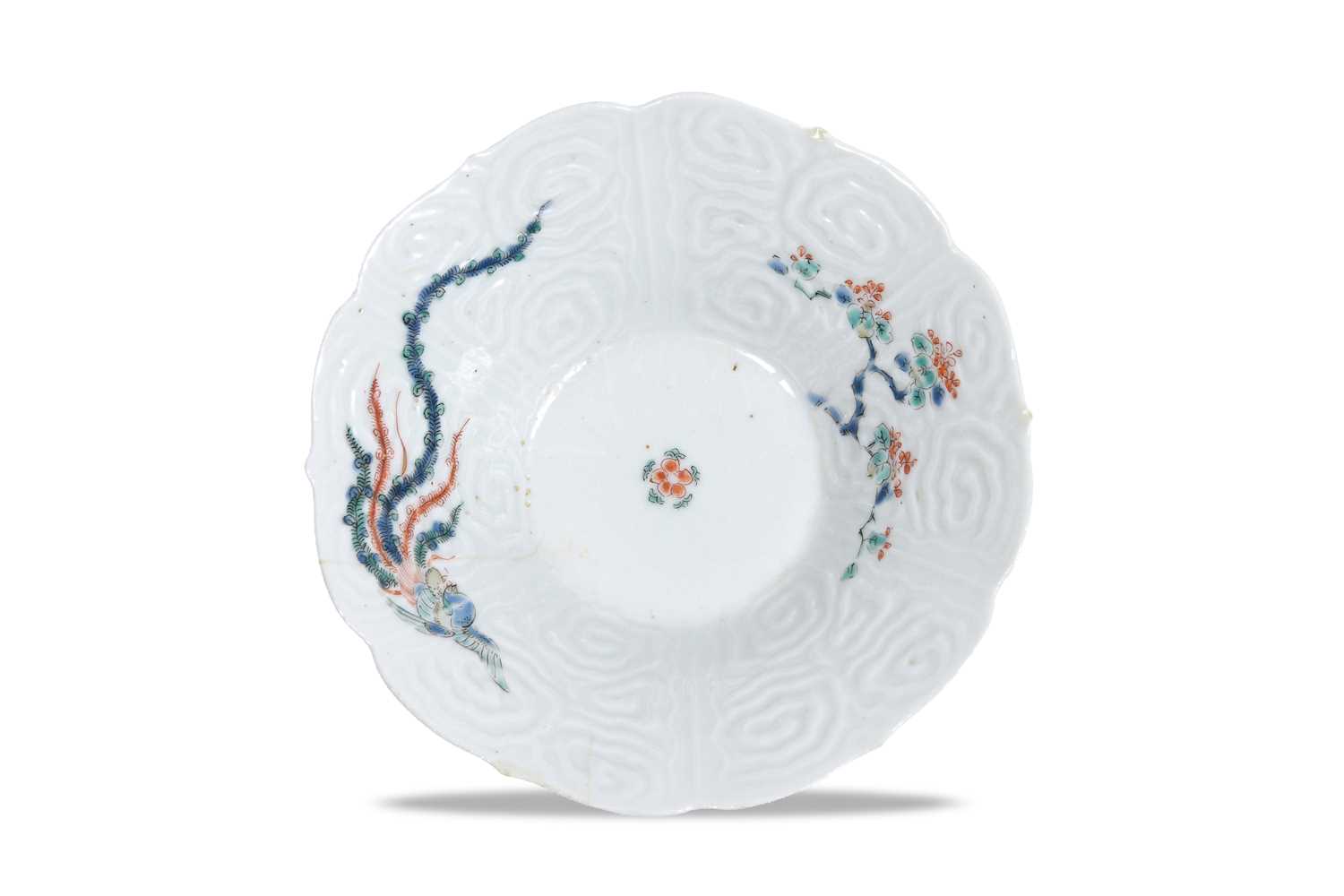 Lot 20 - A JAPANESE MOULDED KAKIEMON 'PHOENIX' BOWL