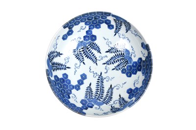 Lot 24 - A JAPANESE BLUE AND WHITE NABESHIMA ‘WISTERIA’ DISH AND TWO NABESHIMA ‘WILD ORCHID’ SAUCERS