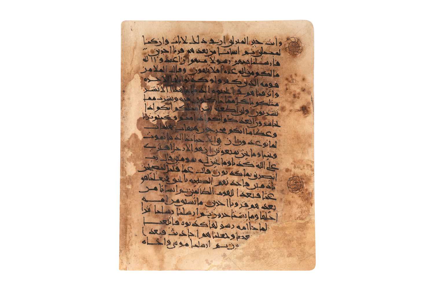 Lot 64 - A KUFIC QUR'AN LEAF