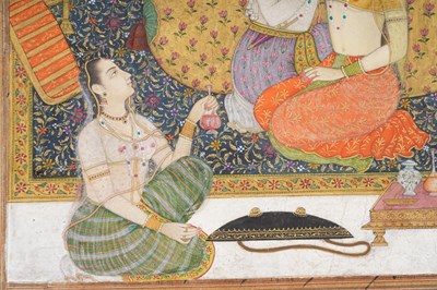 Lot 61 - AN INDIAN MINIATURE DEPICTING A MUGHAL PRINCE WITH HIS CONSORT