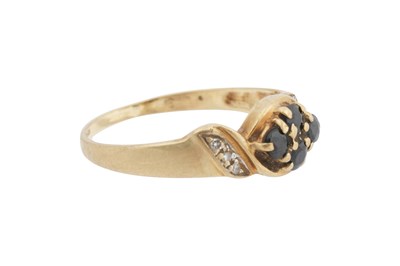 Lot 47 - A 9CT GOLD BLACK STONE AND DIAMOND RING