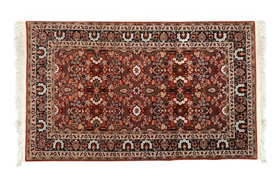 Lot 106 - A PERSIAN WOOL RUG