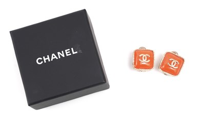 Lot 71 - A PAIR OF BOXED CHANEL POURED ORANGE GLASS AND GILT METAL CLIP EARRINGS