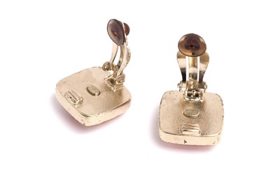 Lot 71 - A PAIR OF BOXED CHANEL POURED ORANGE GLASS AND GILT METAL CLIP EARRINGS