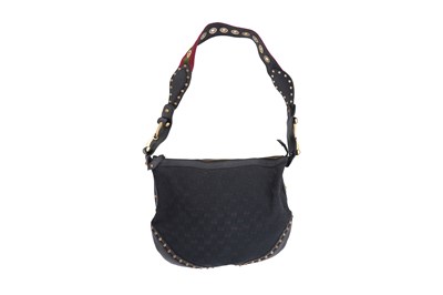 Lot 129 - A GUCCI BLACK 'GG' CANVAS AND STUDDED LEATHER SHOULDER BAG