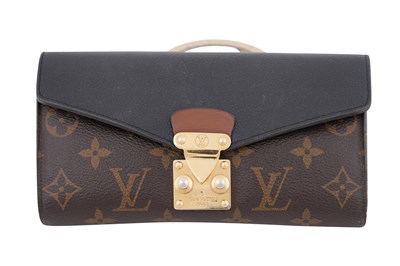 Lot 139 - A LOUIS VUITTON MONOGRAM CANVAS AND BLACK LEATHER S-LOCK LONG WALLET