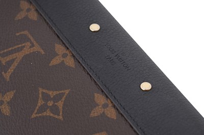 Lot 139 - A LOUIS VUITTON MONOGRAM CANVAS AND BLACK LEATHER S-LOCK LONG WALLET