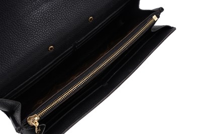 Lot 139 - A LOUIS VUITTON MONOGRAM CANVAS AND BLACK LEATHER S-LOCK LONG WALLET