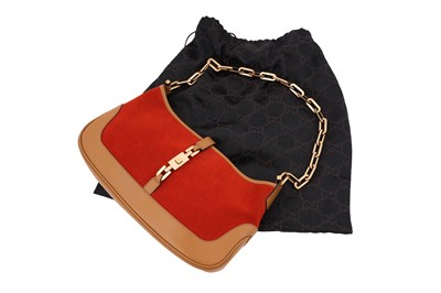 Lot 128 - A GUCCI ‘JACKIE’ BURNT ORANGE SUEDE AND TAN LEATHER SHOULDER BAG