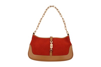 Lot 128 - A GUCCI ‘JACKIE’ BURNT ORANGE SUEDE AND TAN LEATHER SHOULDER BAG