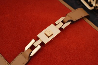 Lot 128 - A GUCCI ‘JACKIE’ BURNT ORANGE SUEDE AND TAN LEATHER SHOULDER BAG