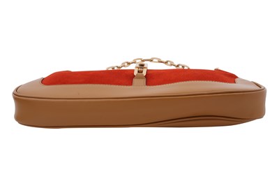 Lot 128 - A GUCCI ‘JACKIE’ BURNT ORANGE SUEDE AND TAN LEATHER SHOULDER BAG