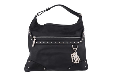 Lot 137 - A VERSACE BLACK LEATHER STUDDED SHOULDER BAG WITH SILVER-TONE HARDWARE AND SIGNATURE CHARM
