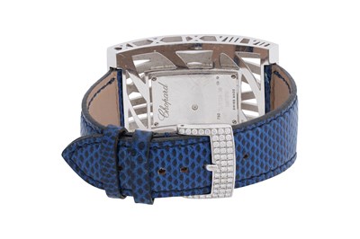 Lot 8 - A CHOPARD 'MONTRE DAME XL' 18CT WHITE GOLD, SAPPHIRE AND DIAMOND LADIES WRISTWATCH