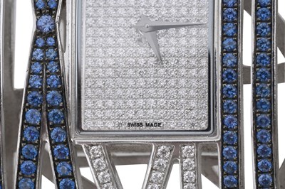 Lot 8 - A CHOPARD 'MONTRE DAME XL' 18CT WHITE GOLD, SAPPHIRE AND DIAMOND LADIES WRISTWATCH